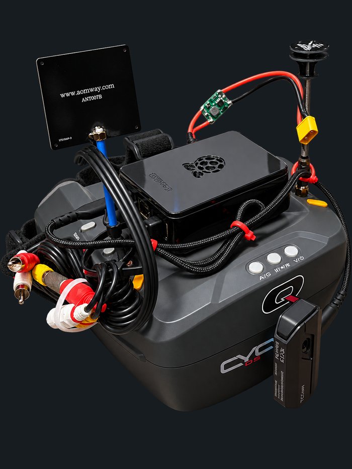 Angled view of the finished headset showing the camera, cabling and antenna